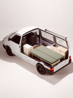 Render 3D del Nom Total Kit che mostra la disposizione dei moduli all’interno del van, configurazione completa per camperizzazione modulare.